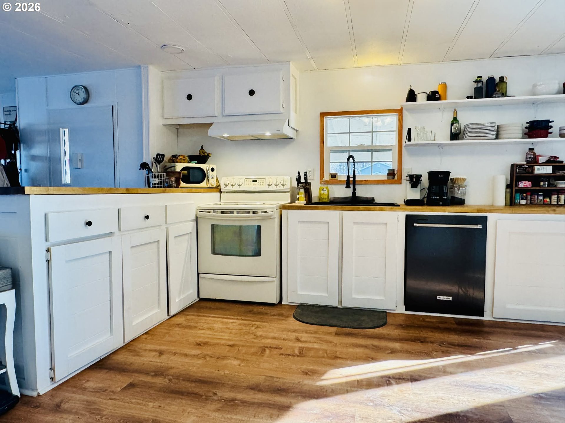 1020 South 2nd Street Union, OR 97883 - Photo 7 of 37 a kitchen with granite countertop a sink and cabinets