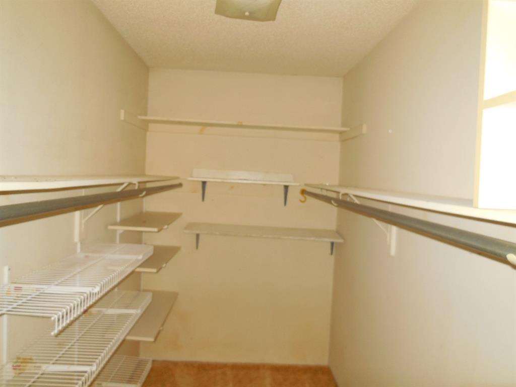 609 West Main Street Ranger, TX 76470 - Photo 6 of 29 a bathroom with a shower