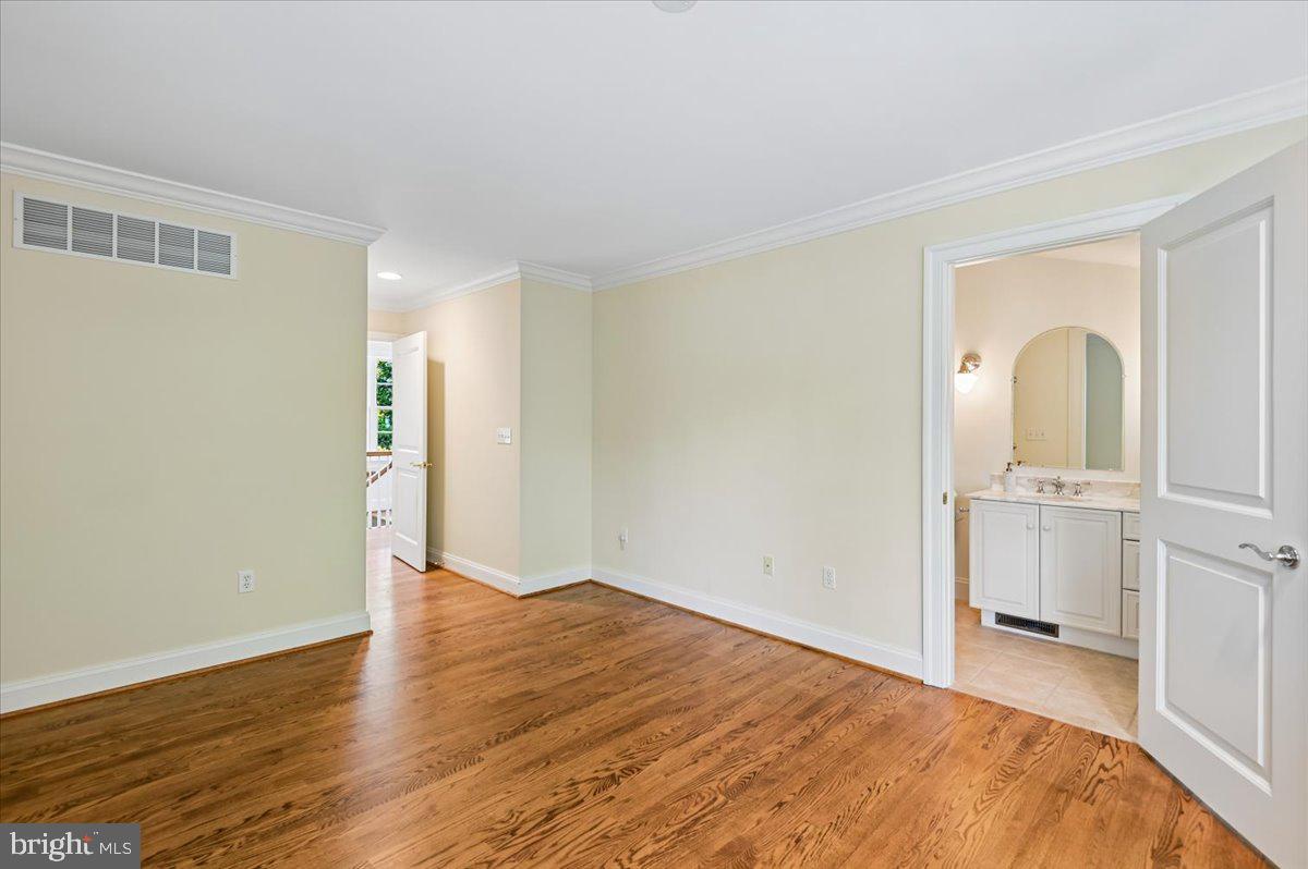 2700 Falling Timber Trail Edgewater, MD 21037 - Photo 44 of 89 a view of empty room with wooden floor