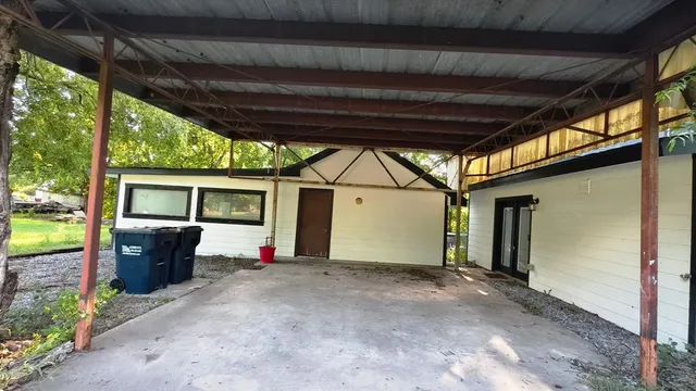 a view of porch with green space
