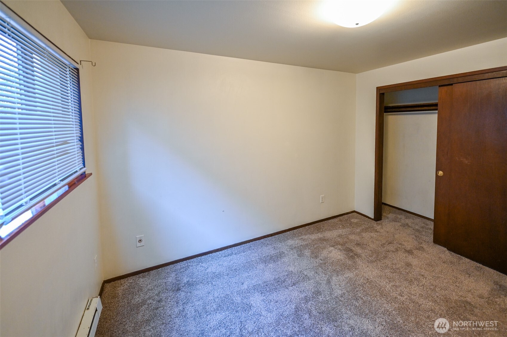719 North 85th Street Seattle, WA 98103 - Photo 13 of 15 a view of an empty room