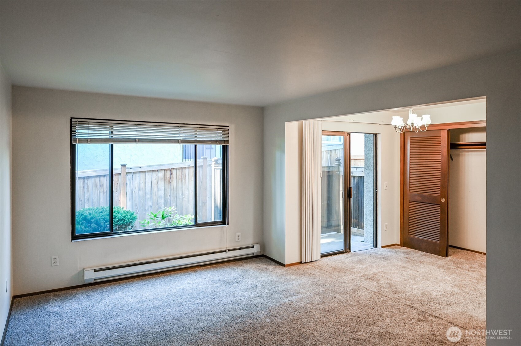 719 North 85th Street Seattle, WA 98103 - Photo 14 of 15 an empty room that has a large window