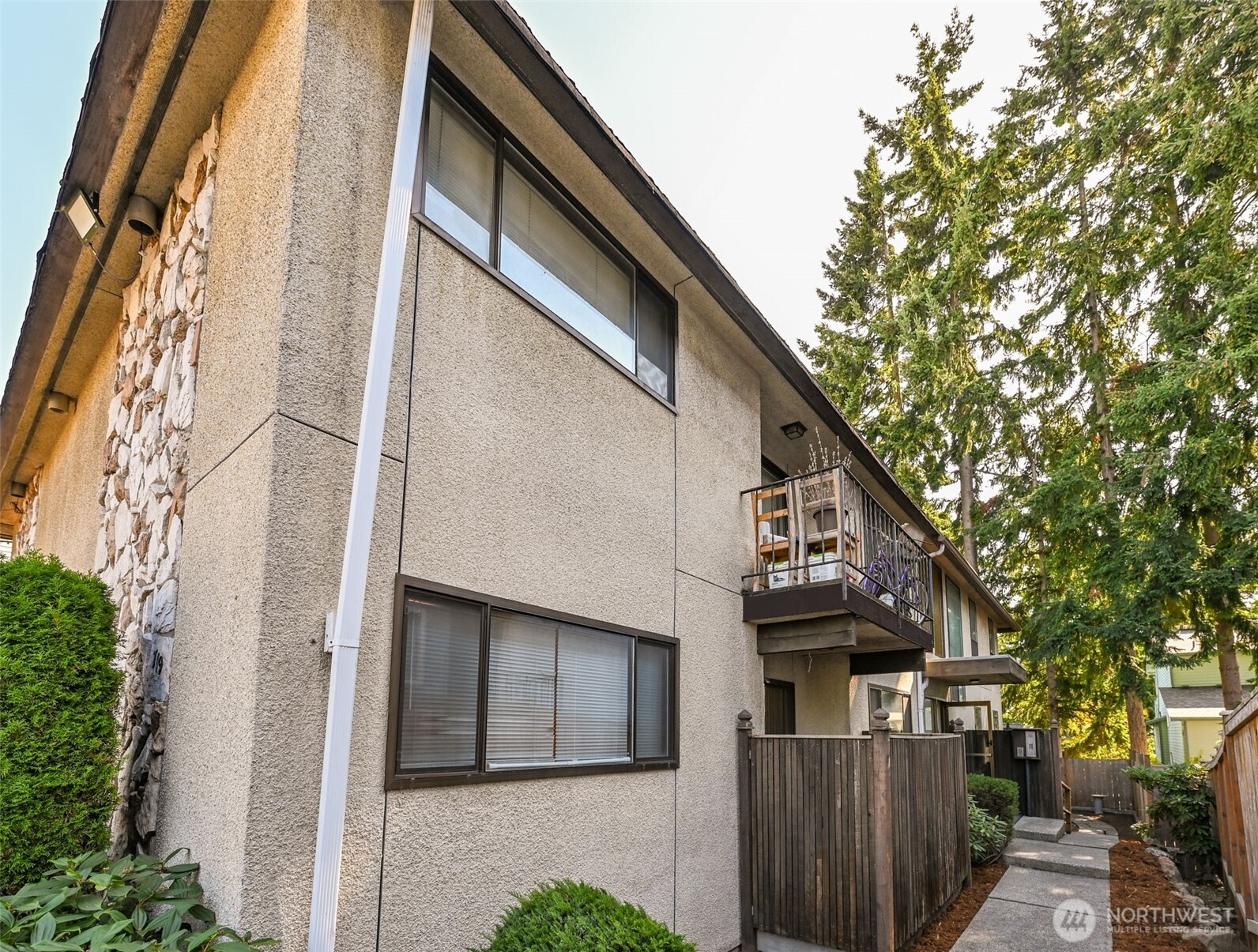719 North 85th Street Seattle, WA 98103 - Photo 2 of 15 a front view of a house with garage