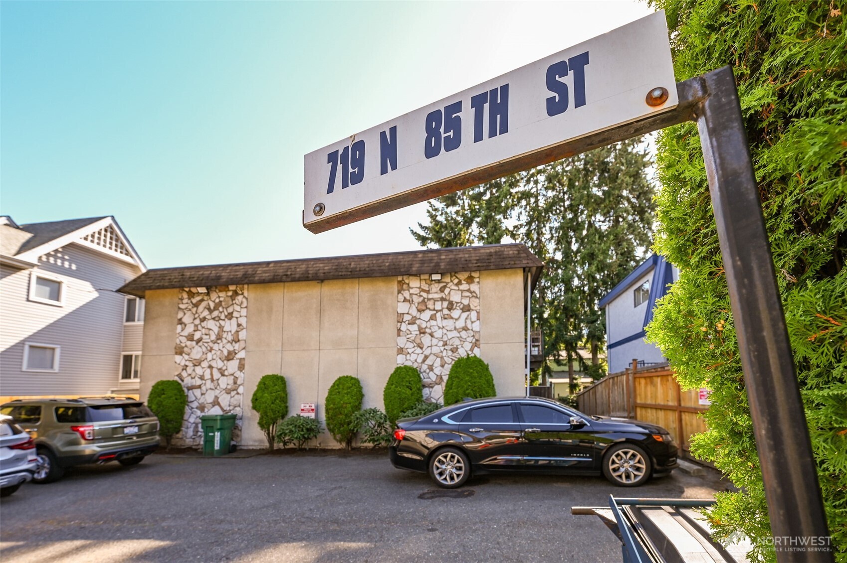 719 North 85th Street Seattle, WA 98103 - Photo 3 of 15 a car parked in front of a building