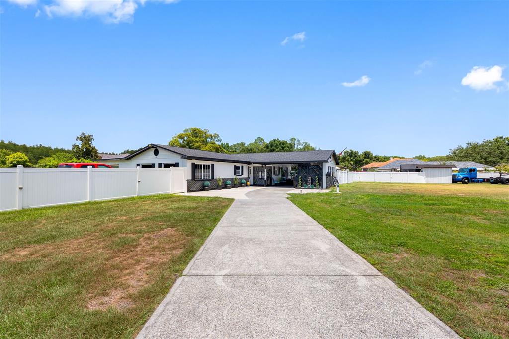 5515 Lake Le Clare Road Lutz, FL 33558 - Photo 4 of 59