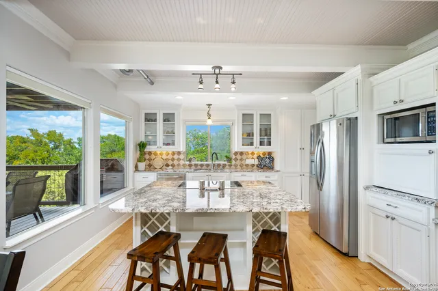 a bedroom with a bed and white walls