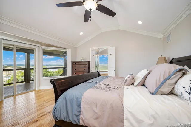 a view of a balcony with a table and chairs