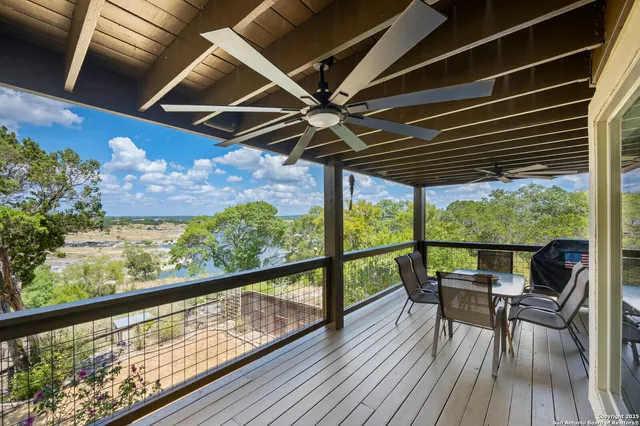 an aerial view of a house with a yard and a garden