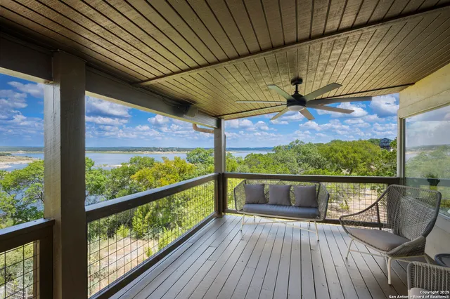 a view of a lake from a balcony