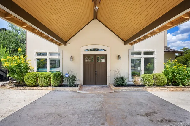 a bedroom with two beds and a window