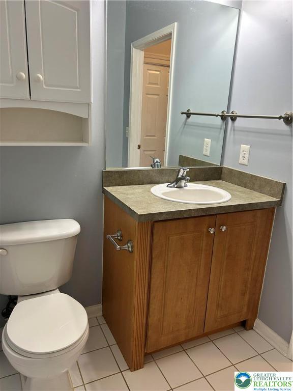 1113 Old Course Lane Easton, PA 18042 - Photo 18 of 26 a bathroom with a granite countertop toilet sink and mirror