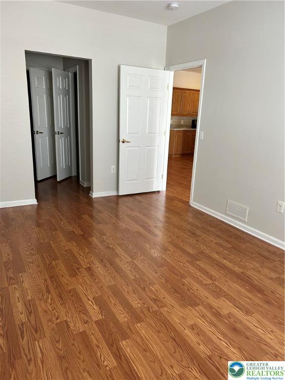 1113 Old Course Lane Easton, PA 18042 - Photo 4 of 26 an empty room with wooden floor and closet