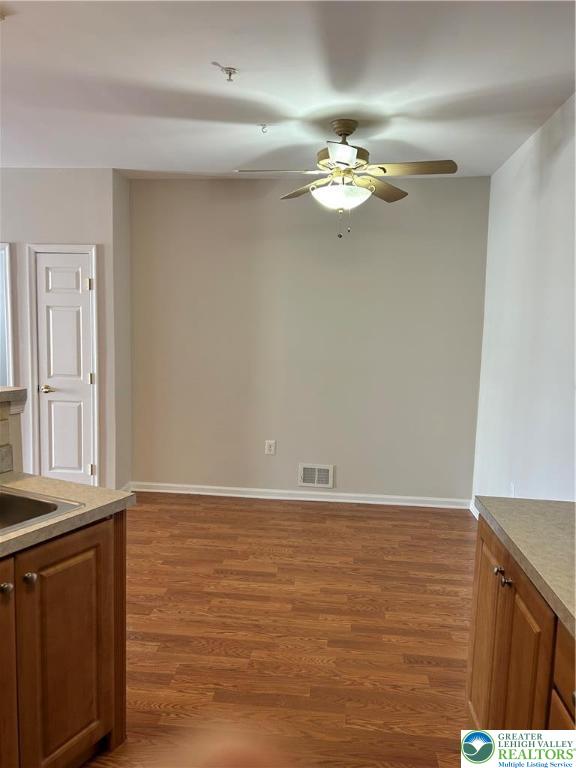 1113 Old Course Lane Easton, PA 18042 - Photo 8 of 26 a view of a livingroom with a ceiling fan