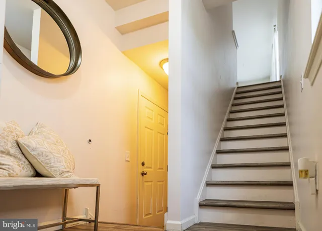 a view of entryway with wooden floor
