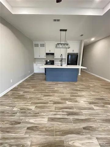 a view of kitchen and kitchen counter