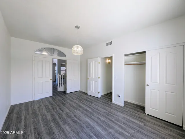 a bathroom with a toilet and a bathtub