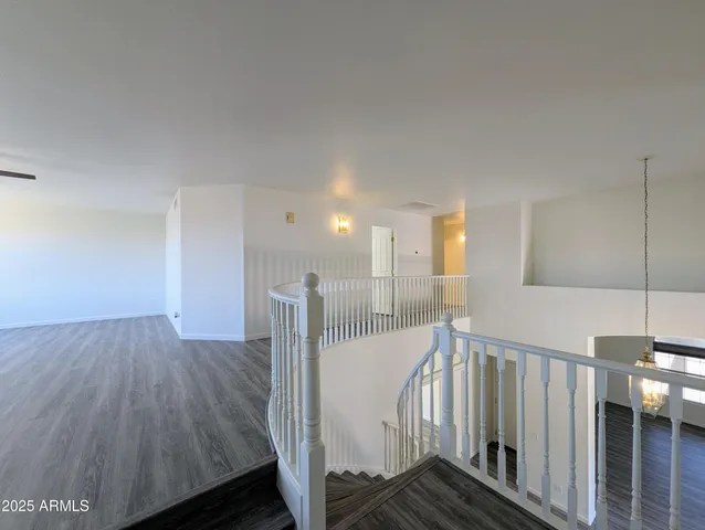 a house with palm tree in front of it