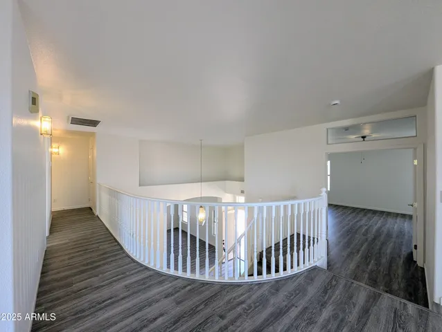 a view of a house with a yard and garage