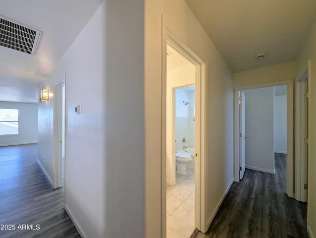 a view of a swimming pool and lounge chair