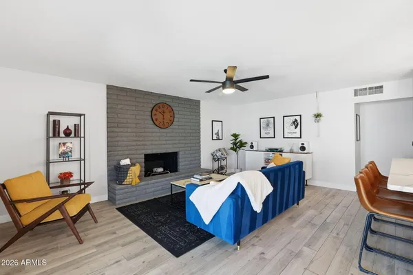 a living room with furniture and a table