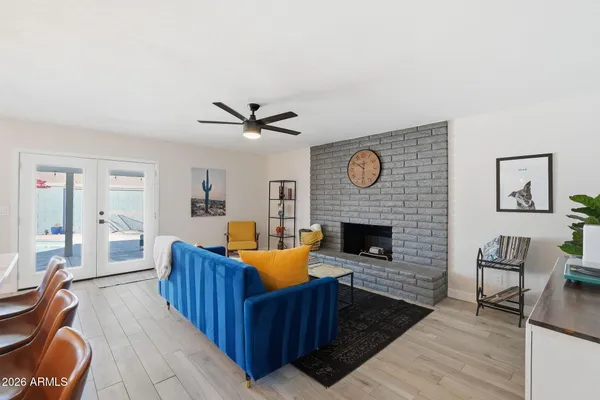 a living room with furniture and a table