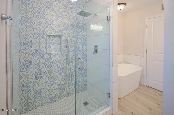 a bathroom with a sink double vanity and a mirror