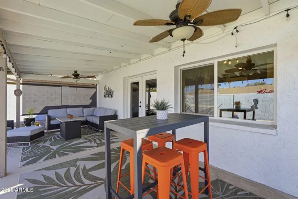 a bathroom with a toilet and a bathtub