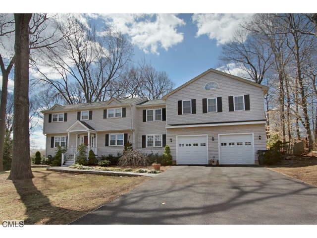 123 Saxonwood Road Fairfield, CT 06825 - Photo 1 of 1 a view of an house with backyard space and balcony