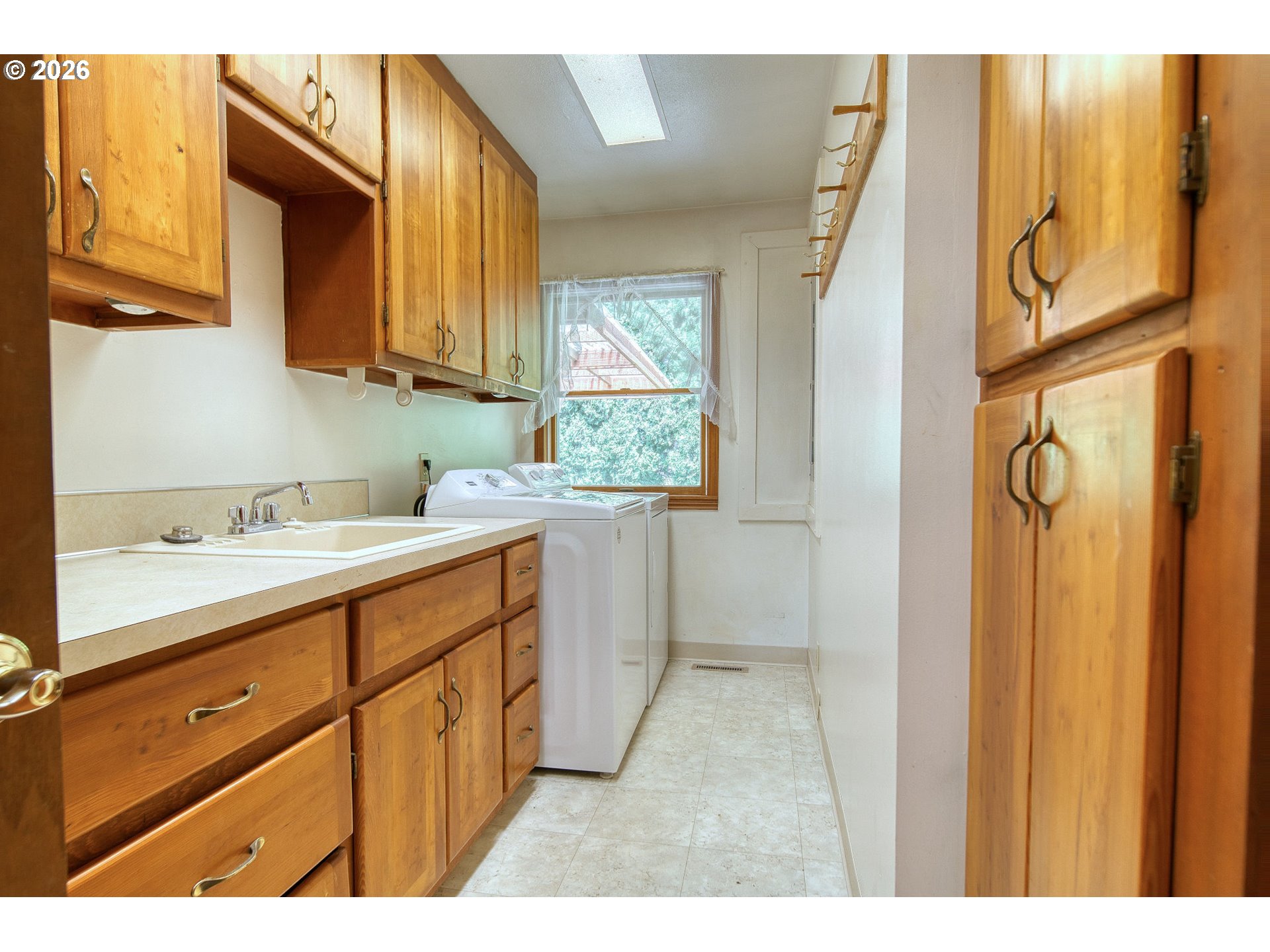 33887 Church Road Warren, OR 97053 - Photo 17 of 48 a bathroom with a sink a mirror and a bathtub