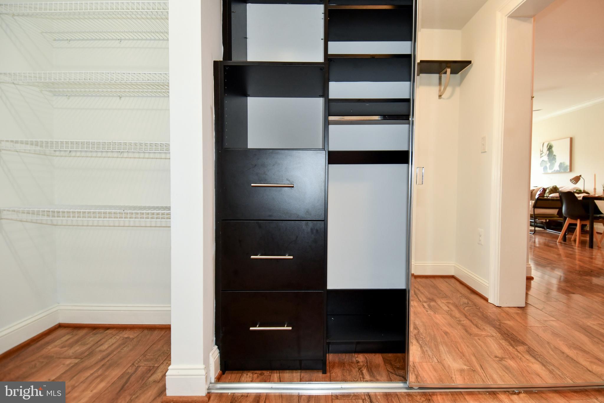 6301 Edsall Road, Unit 115 Alexandria, VA 22312 - Photo 21 of 37 a view of walk in closet with empty racks