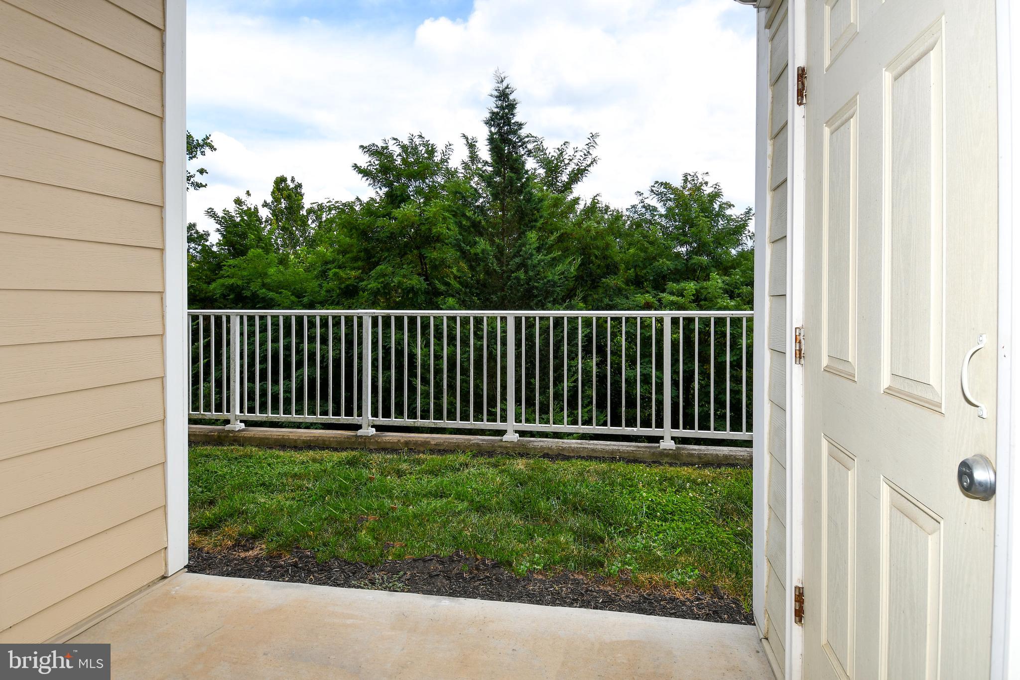 6301 Edsall Road, Unit 115 Alexandria, VA 22312 - Photo 23 of 37 a view of a backyard with a garden