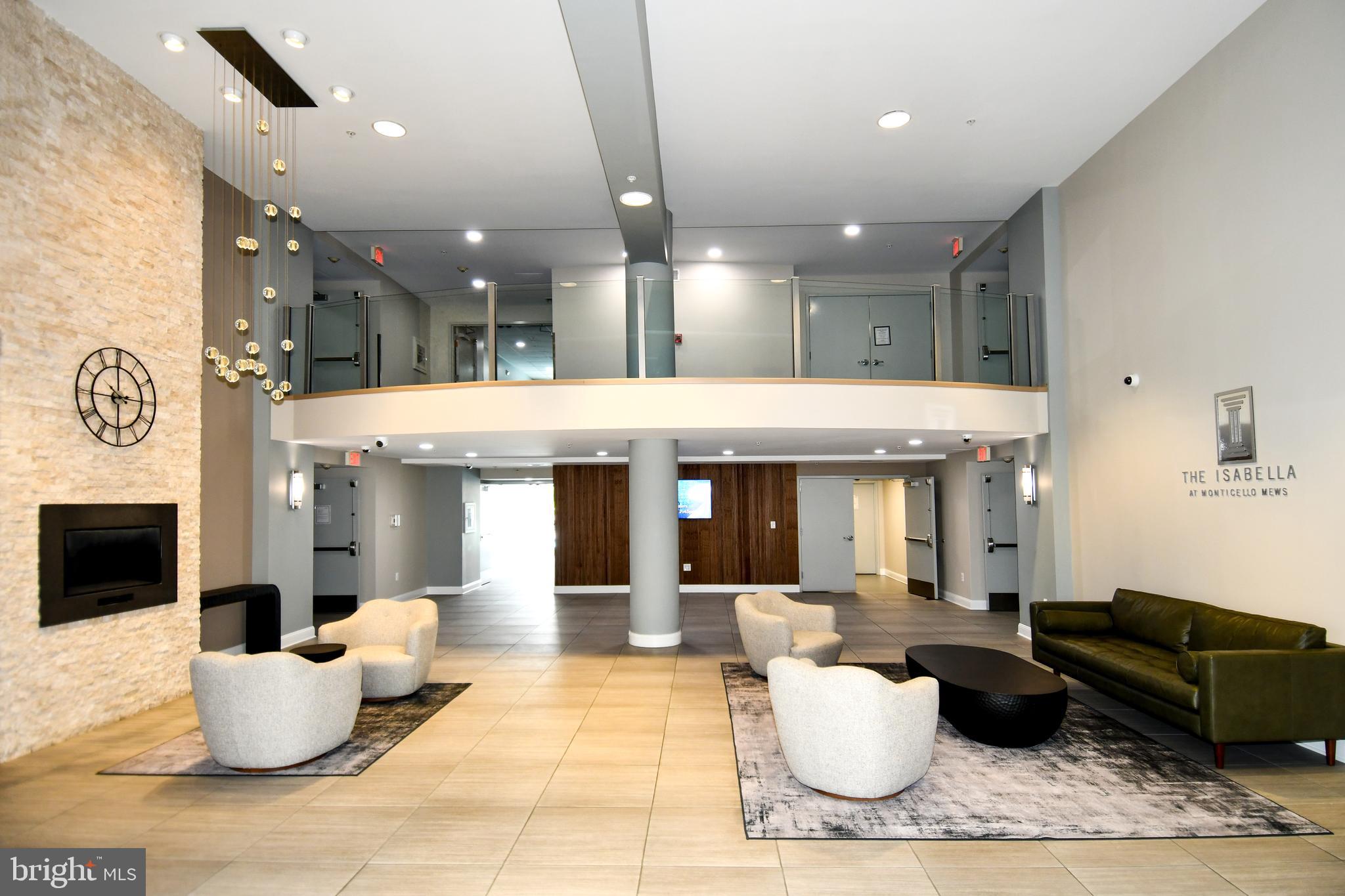 6301 Edsall Road, Unit 115 Alexandria, VA 22312 - Photo 30 of 37 a living room with furniture and a view of kitchen