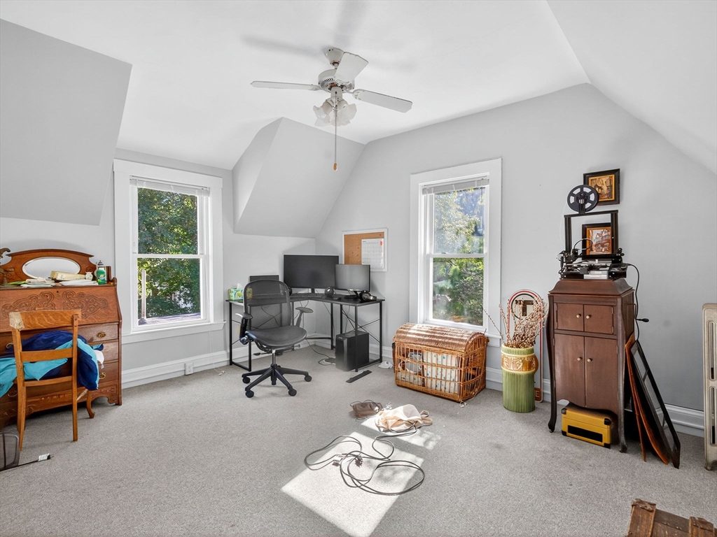 148 Beaver Street Boston, MA 02136 - Photo 18 of 25 a view of a workspace with furniture and a window