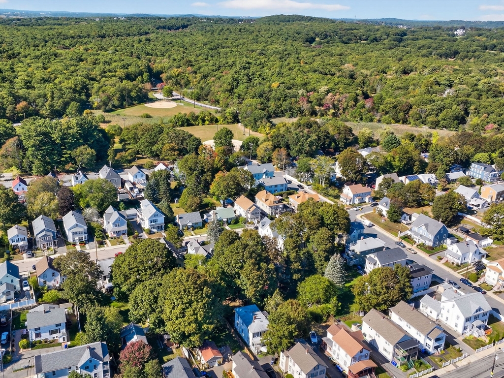 148 Beaver Street Boston, MA 02136 - Photo 25 of 25 an aerial view of residential houses with outdoor space and trees