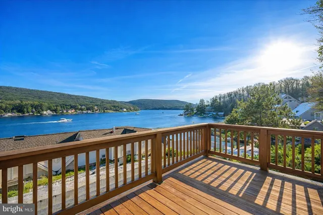 a view of city and mountain from a balcony