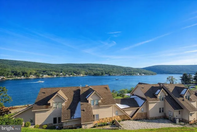 an aerial view of a house with a garden