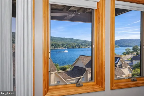 a view of living room and wooden floor