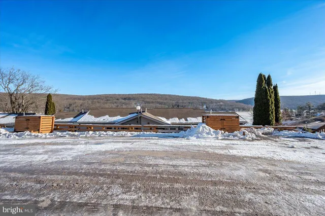 a view of a road with an ocean view
