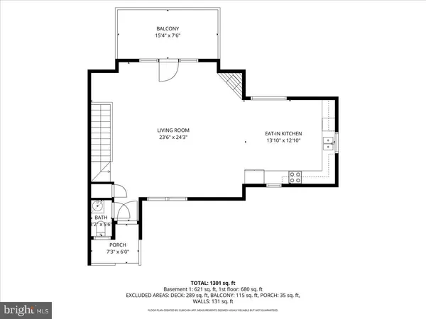 a picture of a room with a white wall and a refrigerator