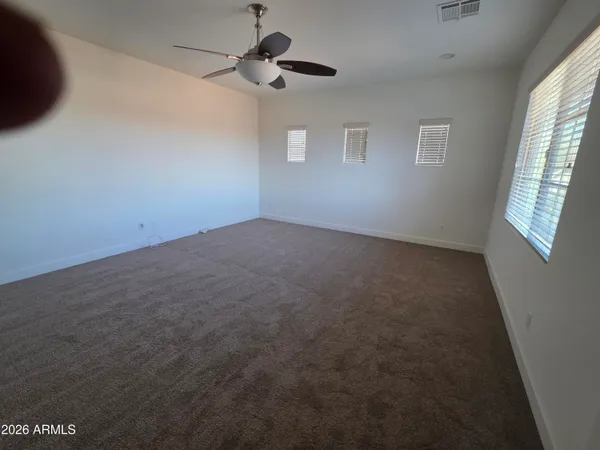 a view of balcony with furniture