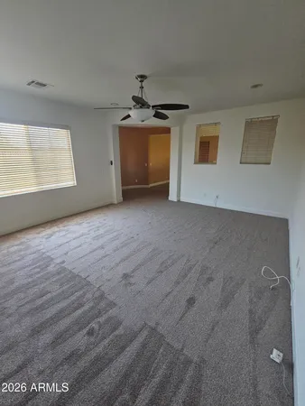 a view of a bathroom from a hallway