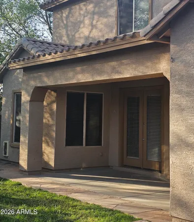 a view of wooden fence and a pathway
