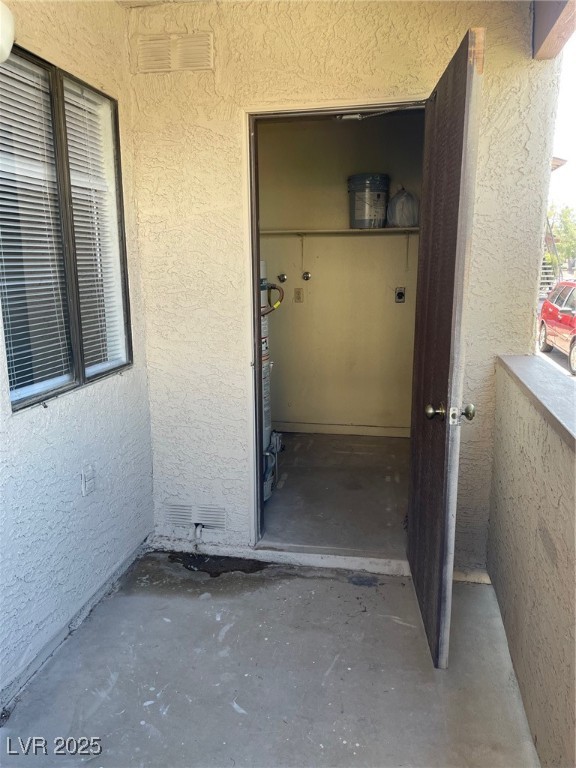 3717 Snorkel Circle, Unit C Las Vegas, NV 89108 - Photo 10 of 17 Property entrance featuring stucco siding