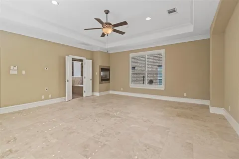 a bathroom with a granite countertop sink a mirror and a shower