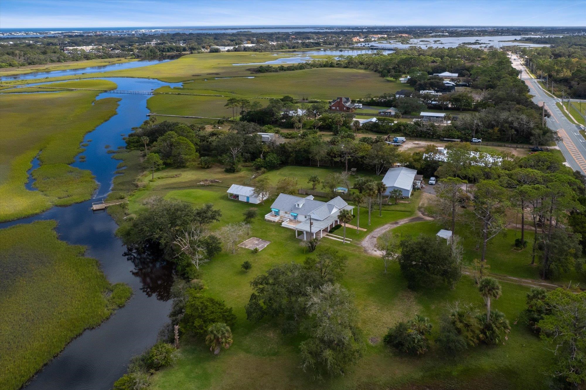 3040 Lewis Speedway St. Augustine, FL 32084 - Photo 6 of 6 a view of a lake with a city