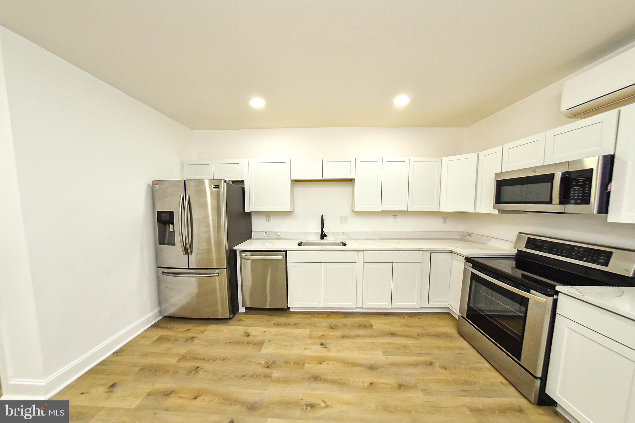 3704 Suitland Road Southeast Washington, DC 20020 - Photo 58 of 70 Modern kitchen with sleek finishes.