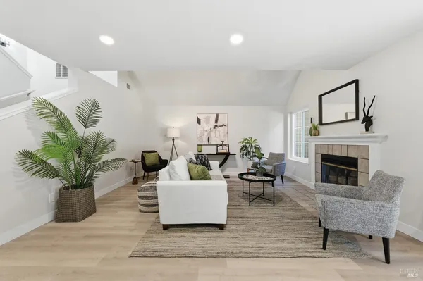 a view of a hallway with paintings on the wall