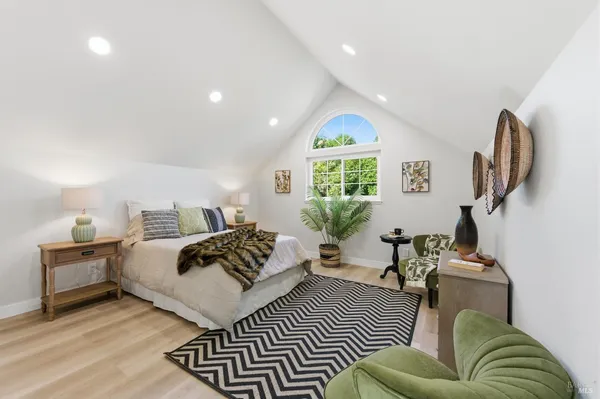 a bathroom with a sink toilet and mirror