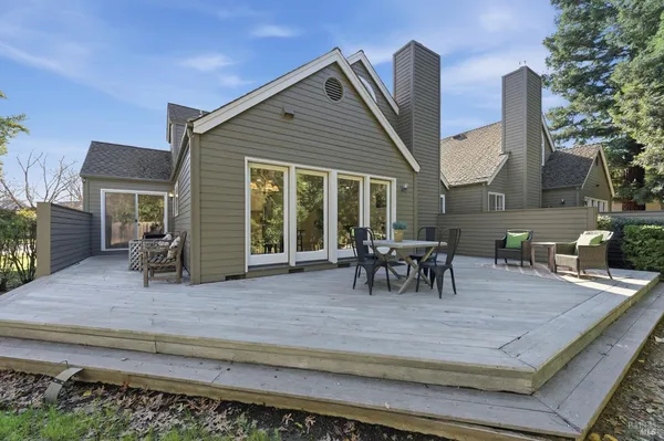a view of a table and chairs in patio