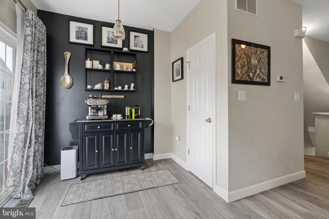 a view of a hallway with workspace